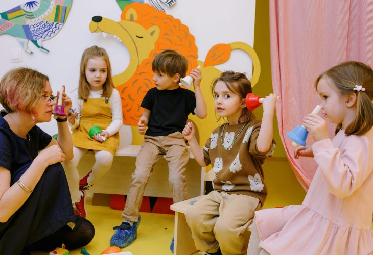 preschool teacher and students