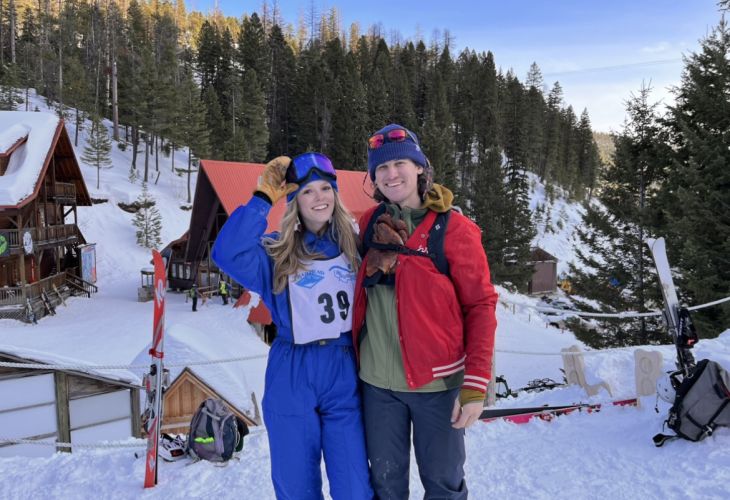 Tele skiers in front of lodge