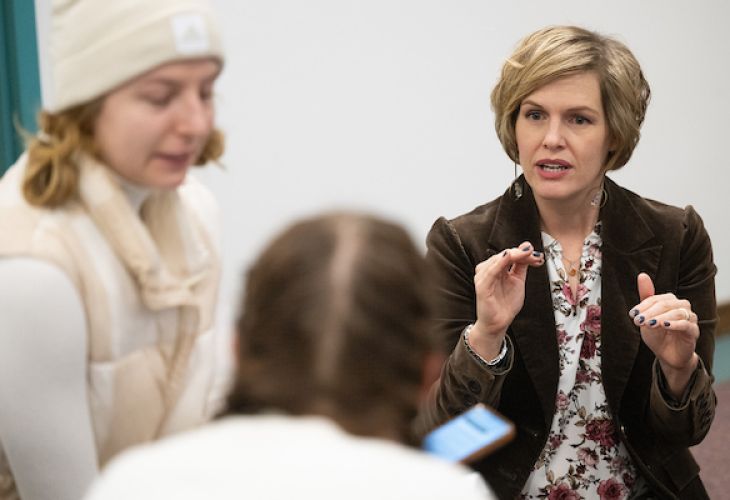 professor and students interacting