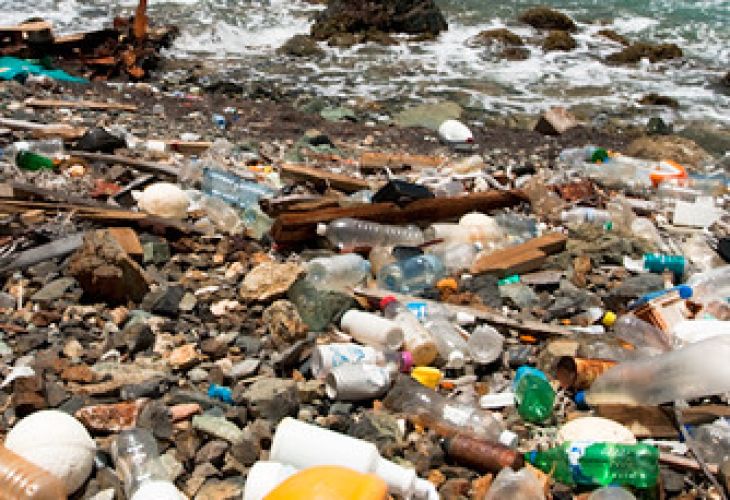 island shore polluted by plastic