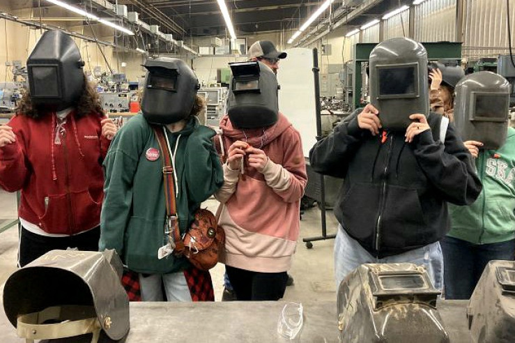 Middle school students in welding face shields at Missoula College 