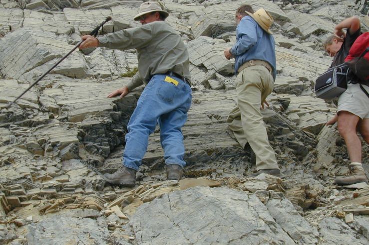 don and two others on the side of a rock face