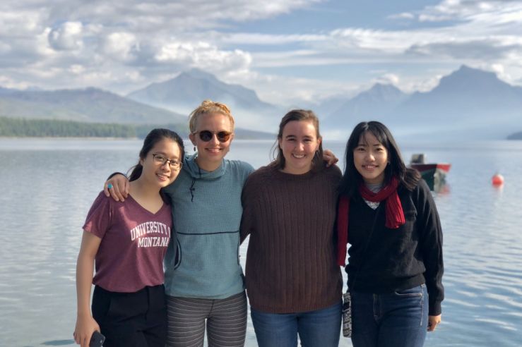 students at a lake