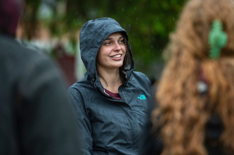 Jacey wearing a rain jacket