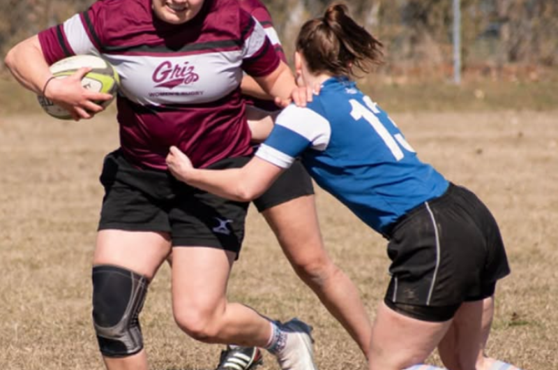 Griz Women's Rugby Player Carrying Ball