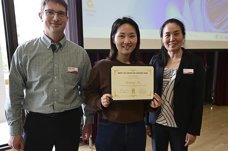 Wenting He posing with two people