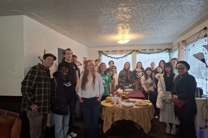 Group of students and staff posing for a photo