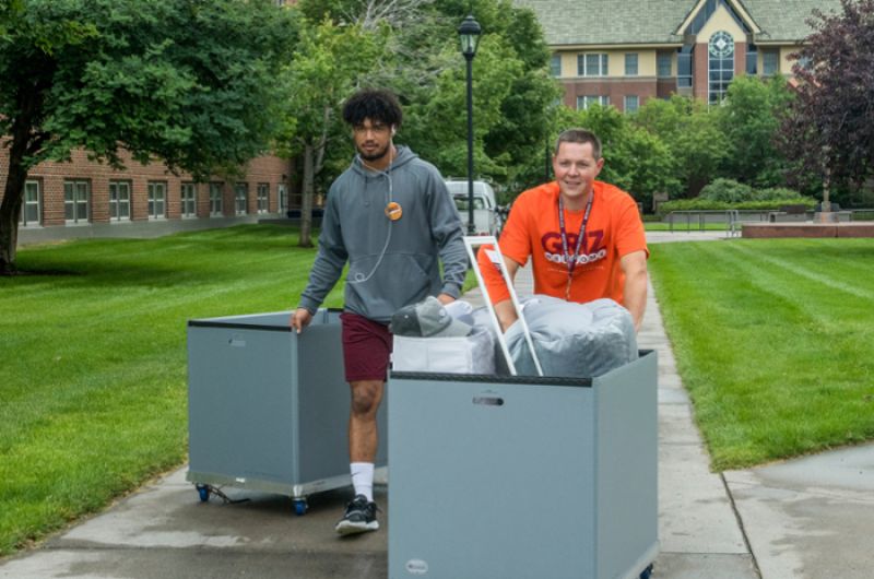 Staff helping students move in to the residence halls.