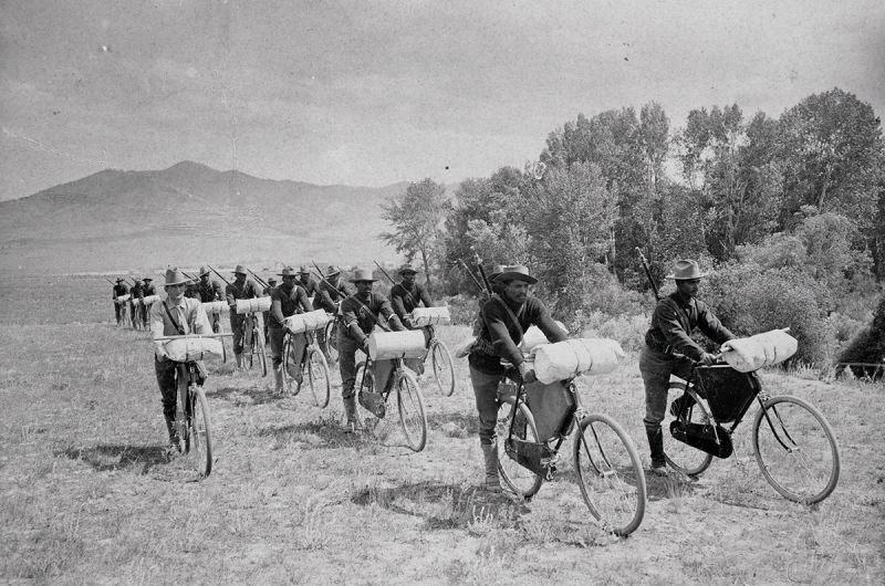 In the field - the U.S. Army Bicycle Corps stationed at Fort Missoula, �����ؿ�. Corps in formation. The man riding beside the two rows of soldiers is Lieutenant James A. Moss. Photograph number 73-0031.