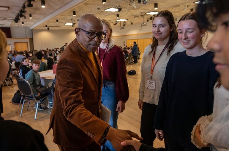 Reverend Nelson talking to students