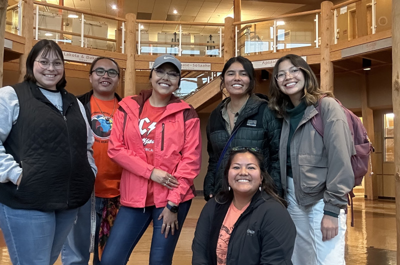 IGSA group taking a picture in the PFNAC Rotunda after an event