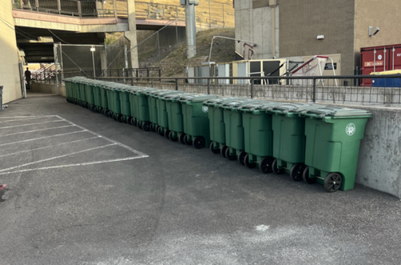 compost bins in a row outside the stadium