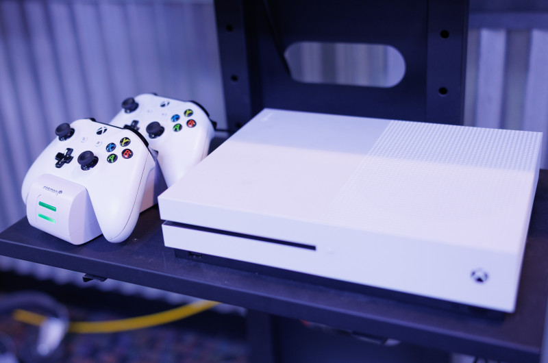 White xbox and headphones