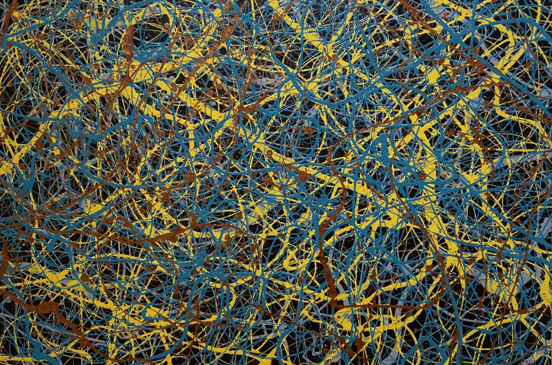 abstract drip painting, black background with blue, red, and yellow paint