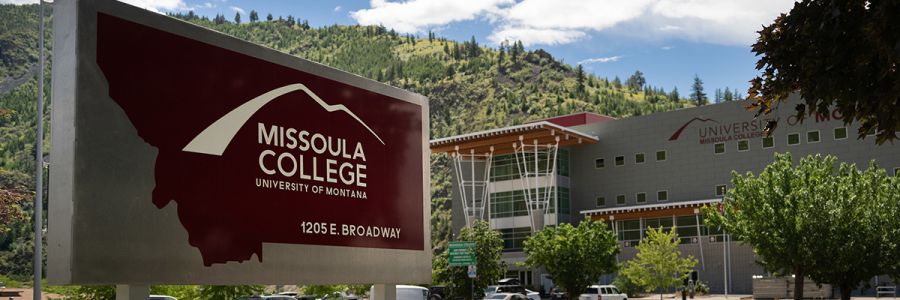 Missoula College building seen from the main sign near the enterance
