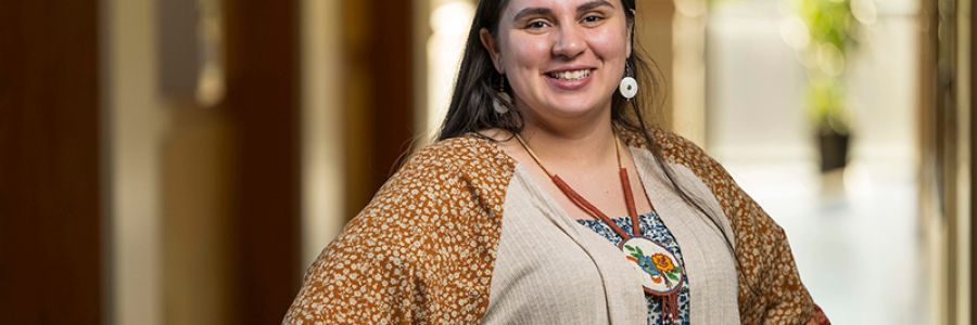 headshot of a student posing and smiling for the camera