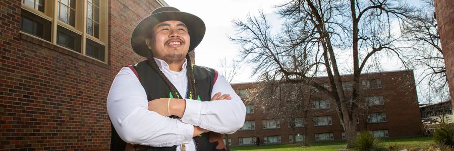 headshot of a student standing outside on the UM campus