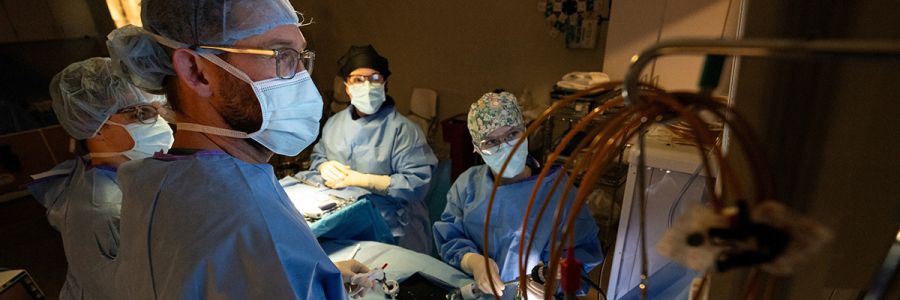 group of people in medical scrubs training