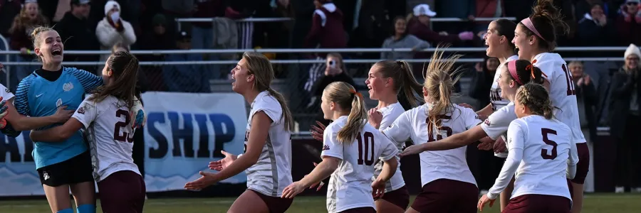 The Griz Soccer team celebrates winning the title match of the Big Sky Conference Championship.