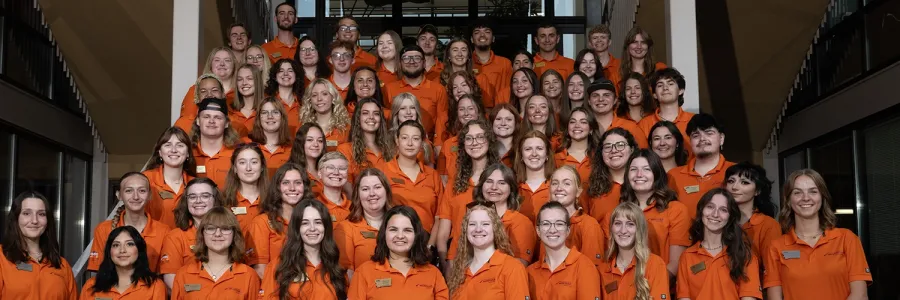 UM Advocates poses for a photo on the steps of the University Center