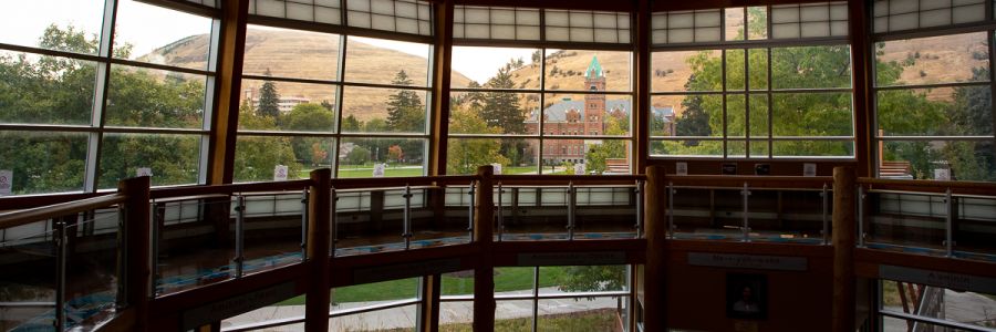a view of the Oval and University Hall from inside the Payne Family Native American Center
