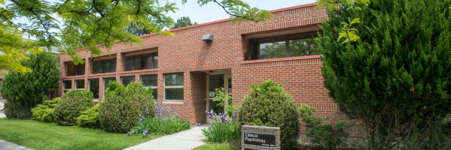 main entrance of the Clinical Psychology building on a sunny day
