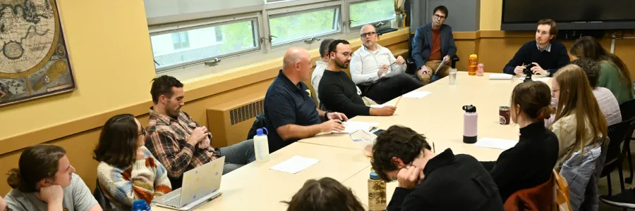 The ؿ History department's Lockridge Workshop - faculty and graduate students gather around a table to discuss a work-in-progress by faculty or grad students.
