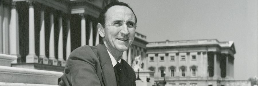 Mike Mansfield sitting on steps of the US capitol building