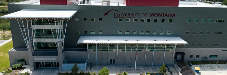 aerial view of Missoula College with the main entrance and sign in view