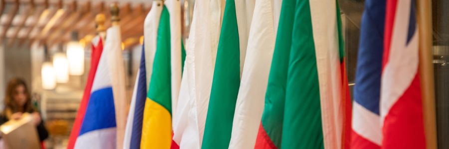 closeup of a row of flags from different nations