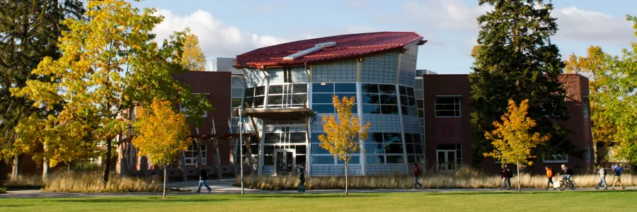 The Payne Family Native American Center building on a crisp autumn day on the University of Montana campus.