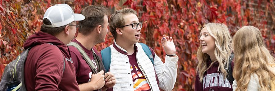 group of students talking on UM campus