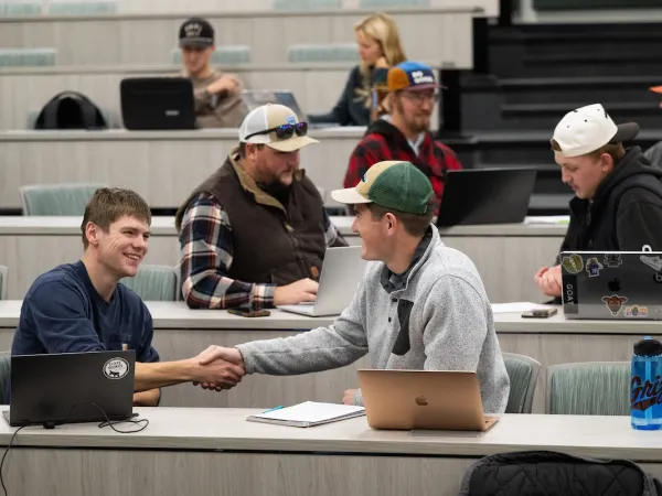 UM students participate in a business meet-up role-playing exercise during a Professional Sales class at UM's College of Business.