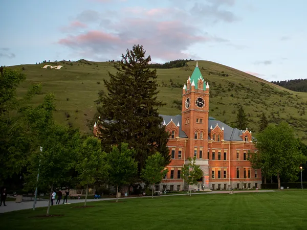 University of Montana's Main Hall on a clear evening just at the beginning of sunset