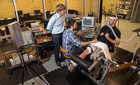 Matthew Bundle and a graduate student conduct an interview with a research subject in Bundle's UM lab