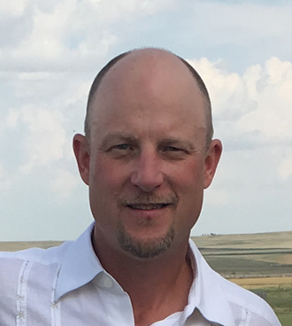Associate Head Coach Lance Heavirland