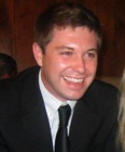 Photo of Dr. Zachary Shindorf wearing a suit