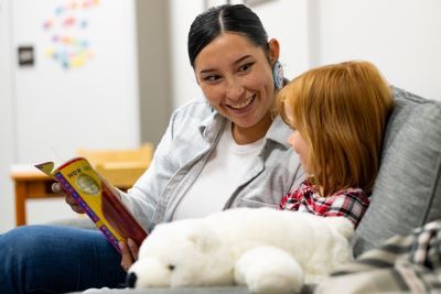 Adult reading to child