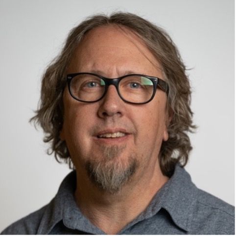 Headshot picture of James Caringi, PhD