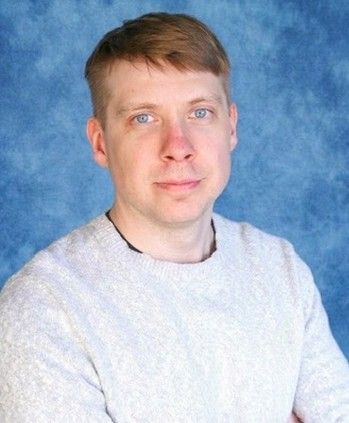 A headshot of Rustin