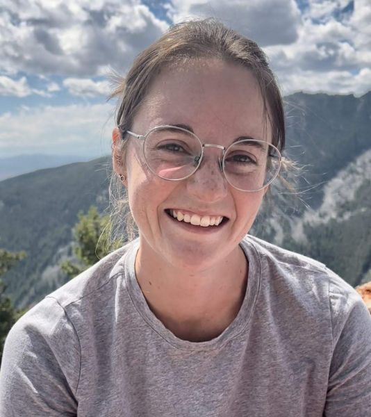A selfie of Rebekah in the mountains.