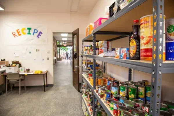 cans and non-pershible foods line the walls of the ASUM food pantry