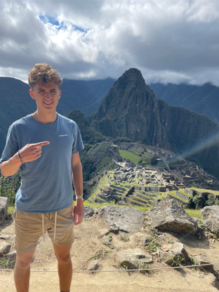 Truman standing at Machu Picchu