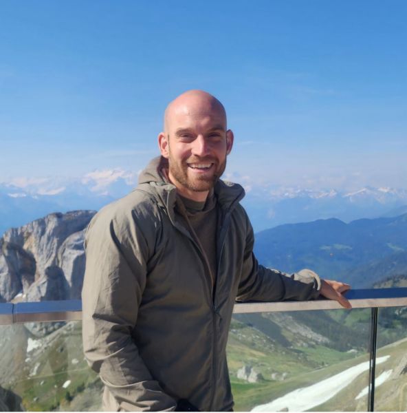 headshot of Chris Dums