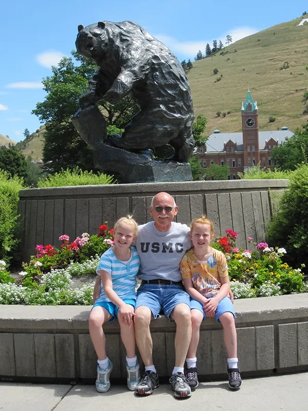 allison mcjannett with sister and grandpa