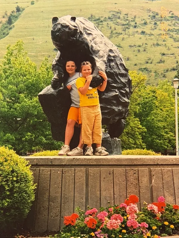anna and sister with bear