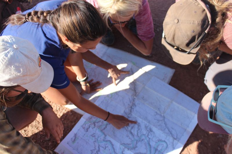 Students consulting a map in Colorado