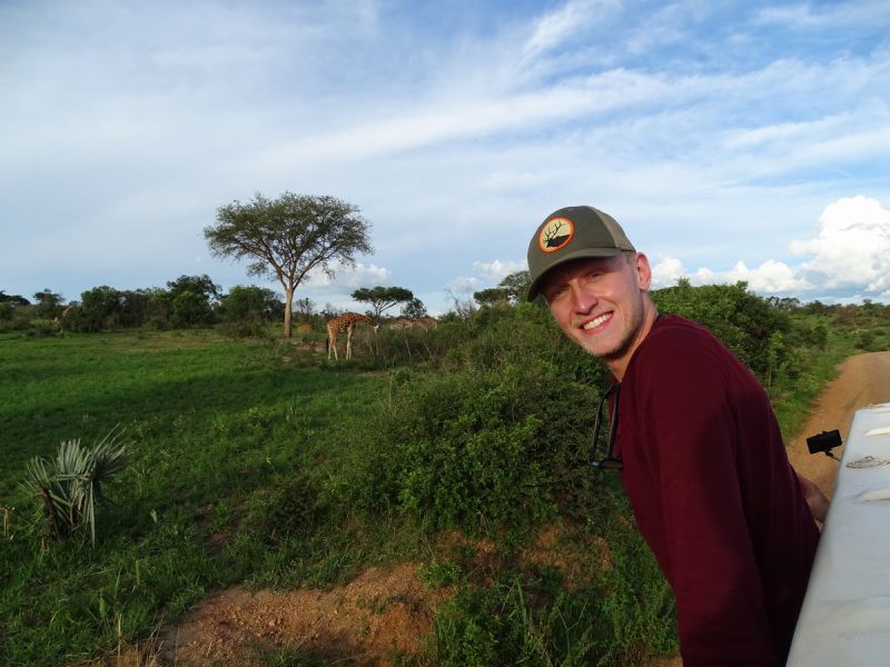 Male student interning in Uganda