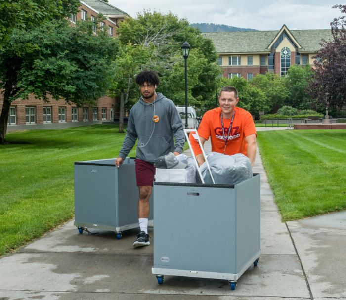 Staff helping students move in to the residence halls.