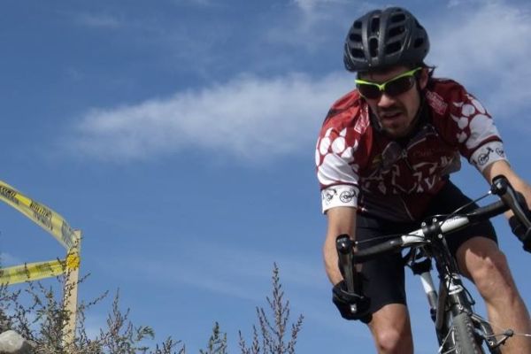 Griz cycle racer going doing course